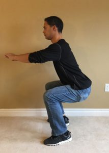 half-squat-with-arm-support
